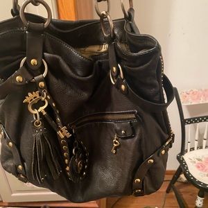 Juicy Couture Handbag leather black in color